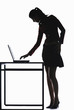Silhouette of businesswoman using laptop.