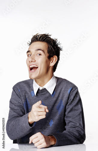Photo: Man pointing at the camera. Man pointing at the camera.
