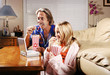 Father and daughter watching movie on the portable dvd player.