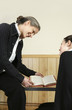 Girl seeking advice from her teacher.