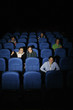 Teenagers watching movie in cinema.