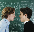 Two boys arguing in the classroom.