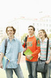 Foto: Boys and girl hanging out together after class. Boys and girl hanging out together after class.
