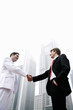 Two businessmen shaking hands.
