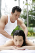Photo: Woman enjoying a body massage Woman enjoying a body massage