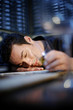 Drunk man sleeping with his head on the table