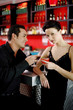 Couple drinking at bar counter