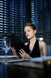 Woman reading menu in a restaurant
