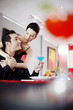 Woman hugging her boyfriend from the back