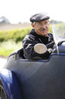 Photo: Senior man traveling in the car Senior man traveling in the car