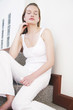 Woman closing her eyes while listening to music on the MP3 player