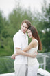 Couple hugging each other at the balcony