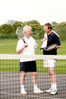 Men chatting in the tennis court