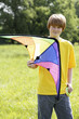 Boy holding a kite