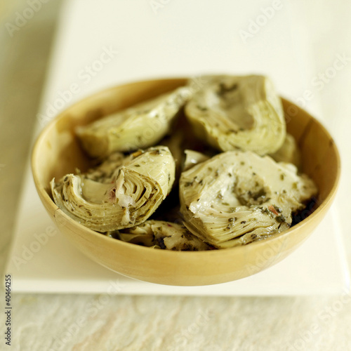Photo: Fresh Italian artichokes in bowl Fresh Italian artichokes in bowl