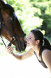 Foto: Woman playing with her horse Woman playing with her horse