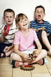 Children singing while playing musical instrument