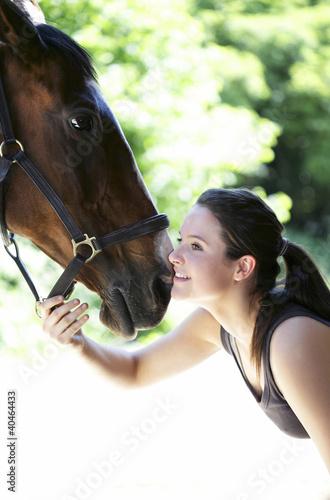 Photo: Woman playing with her horse Woman playing with her horse