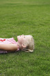 Girl lying on the grass