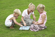 Foto: Children playing board game Children playing board game