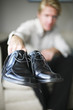 Businessman removing his shoes
