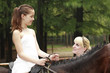 Girl riding a horse