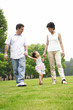 Family strolling in the park