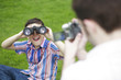 Boy looking through binoculars 