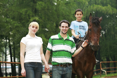 Photo: Young couple and boy Young couple and boy