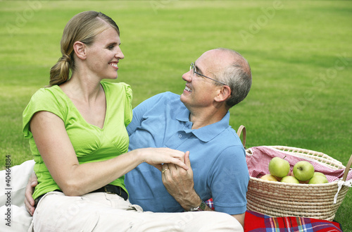 Photo: Husband and wife picnicking Husband and wife picnicking