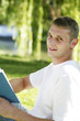 Foto: Young man reading a book Young man reading a book