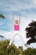 Young woman leaping in the air