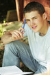 Young man reading a book