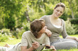 Couple indulging in a piece of chocolate cake
