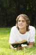 Photo: Young man reading a book Young man reading a book