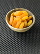 Dried apricots in wooden bowl
