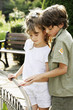 Boy touching girl's hand