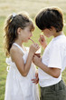 Photo: Boy and girl sharing a cup of hot drink Boy and girl sharing a cup of hot drink