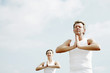 Foto: Couple practicing yoga Couple practicing yoga