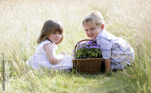 Photo: Children with a basket of flowers Children with a basket of flowers