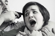 Man holding gun to woman's head