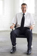 Tied up businessman screaming for help
