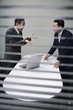 Businessman asking his subordinate about some documents