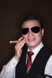 Businessman smoking a cigar