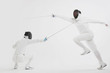 Two men fencing