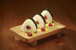 Foto: Sushi on a wooden tray Sushi on a wooden tray