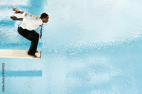 Foto: Businessman about to jump off the diving board Businessman about to jump off the diving board