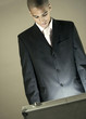 Businessman looking at illuminated open briefcase