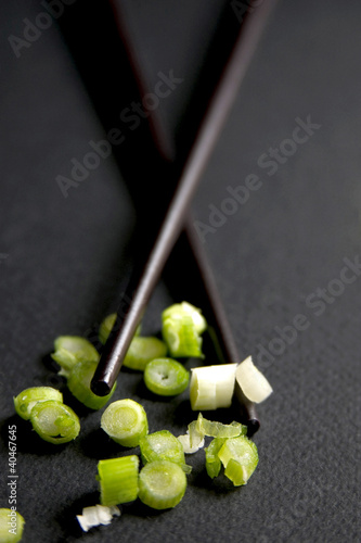 Photo: Chopsticks and chopped spring onions. Chopsticks and chopped spring onions.