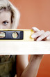 Woman using spirit level